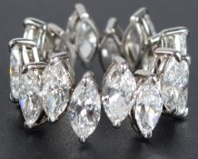 A SUPERB MARQUISE DIAMOND SET ETERNITY RING with 16 diamonds 9-39cts. WS1 colour, set in Platinum.
