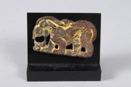A RARE, POSSIBLY ANCIENT CHINESE, GILDED BRONZE ANIMAL SHAPED BELT BUCKLE. 2.5ins x 1.5ins