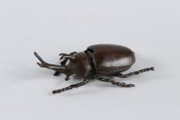 A JAPANESE BRONZE OKIMONO RHINO BEETLE 8cm long