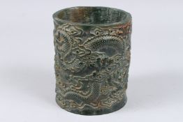 A CHINESE CARVED JADE DRAGON BRUSH POT. 6ins high