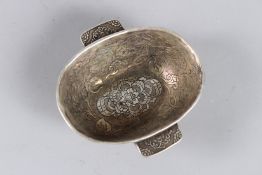 A CHINESE WHITE METAL OVAL BOWL with handles 13cm