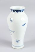 A CHINESE BLUE AND WHITE VASE 23cm high