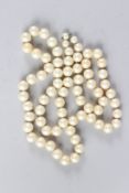 A GOLD COLOURED NECKLACE 50cm long, beads 1cm diameter.