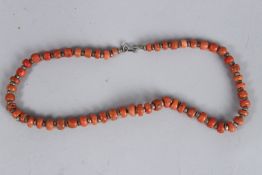 A TIBETAN ANTIQUE NATURAL CORAL AND SILVER NECKLACE