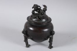 A GOOD CIRCULAR BRONZE CENSER with fo dog. 15cm high.