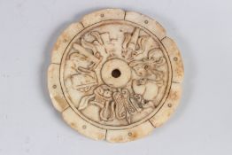 A CHINESE SOAPSTONE FIGURE decorated with eight immortals