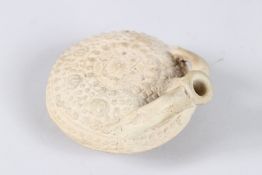 A RARE 13TH CENTURY PERSIAN SELJUK UNGLAZED TWIN HANDLED MOON FLASK. 4.5ins diameter.