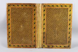 A KASHMIRI LACQUER BINDING 35cm long 26cm wide