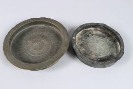 TWO 12TH - 13TH CENTURY PERSIAN OR CENTRAL ASIAN KHURASSAN BRONZE DISHES, one with a mythical