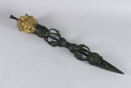 A TIBETAN GILT BRONZE VARJA. 55cm long