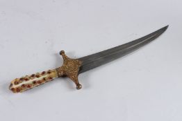 A KHANJAR DAGGER with carnelian agate handle. 38cm long