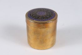 AN UNUSUAL 19TH CENTURY ISLAMIC ENAMELLED BRASS TEA CADDY with calligraphic decoration to the lid.