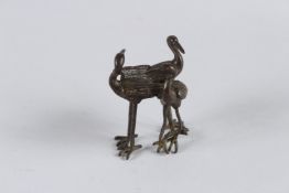 A JAPANESE BRONZE OKIMONO PINE CRANE