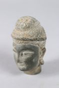 A GHANDARA OR GHANDARA STYLE CARVED GREY SCHIST HEAD OF BUDDHA. 3.5ins