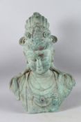 A GOOD BRONZE STATUE BUST OF GUANYIN, also known as KWAN-YIN. 56cms high.