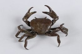 A JAPANESE BRONZE OKIMONO CRAB with articulated legs. 10cm wide.