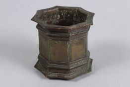 AN 18TH CENTURY ISLAMIC INDIAN OCTAGONAL BRONZE VASE. 3.5ins high