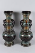 A GOOD LARGE PAIR OF 19TH CENTURY CLOISONNE TWO HANDLED VASES 46cm high