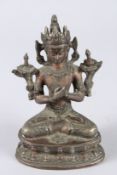 A CHINESE BRONZE SEATED BUDDHA. 7ins high