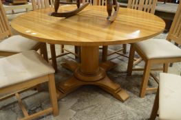 A good modern oak circular pedestal dining table.