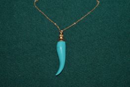 Decorative chain and pendant.