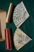 A late 19th century French fan with original box, with mother of pearl stays and painted