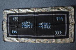 Two Chinese embroidered pieces of fabric.