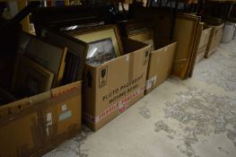 A large quantity of paintings and prints.