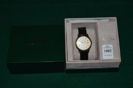 A gentlemans Rotary wristwatch with leather strap, original box and paperwork.
