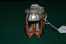 A Mills training hand grenade, with cut-away sections.