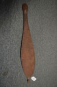 An Aboriginal Woomera spear thrower.