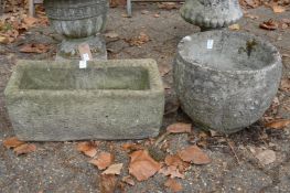 Two reconstituted stone planters.