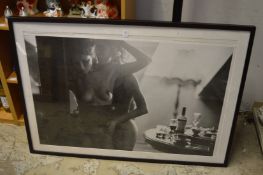 A large erotic black and white photographic print, framed and glazed.
