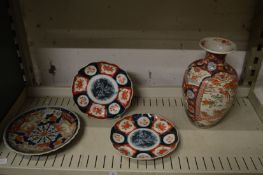 Japanese Imari vase, pair of plates and a similar modern Imari plate.