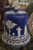 A large blue jasperware stilton dome and stand.
