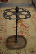 A cast iron walking stick stand.