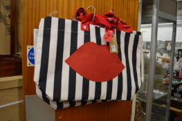 A quantity of Lulu Guinness shopping bags.