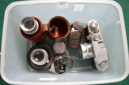 A Leica camera No: 533420 with accessories.