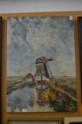 An open landscape with windmill, oil on canvas, unframed.