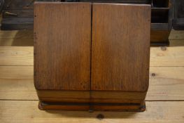 A small oak tabletop stationery casket.