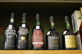Five bottles of various port.