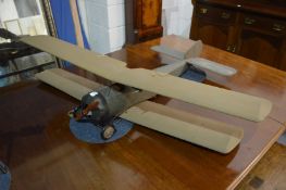 A large model of a biplane.