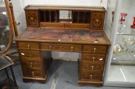 Edwards & Roberts, an Edwardian inlaid mahogany desk.