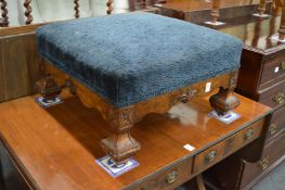 A good walnut framed and upholstered square shaped footstool.
