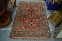 A small Persian style rug, 153cm x 105cm.