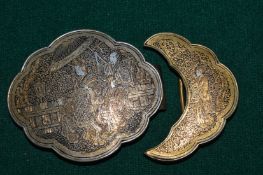 Decorative belt buckle.