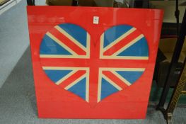 A printed glass picture depicting a heart shaped union jack.