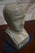 A porcelain phrenology head.