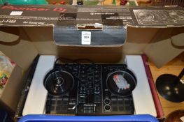 A Pioneer DJ mixing deck, boxed.