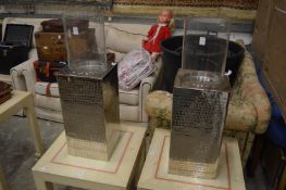 A pair of large storm lamps on chrome plated bases.